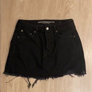 Black ripped edge denim skirt